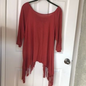 Rust colored Wrangler ladies fringed shirt.